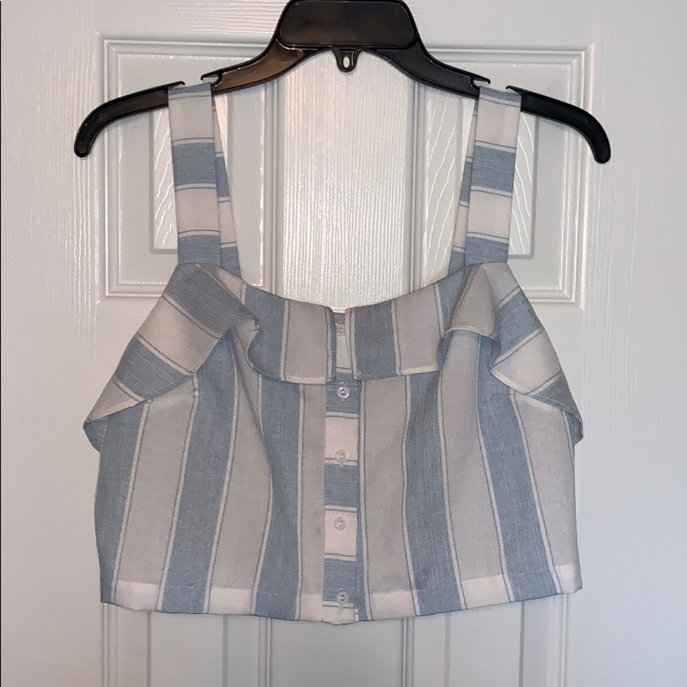 Sleeveless blue and white striped crop top